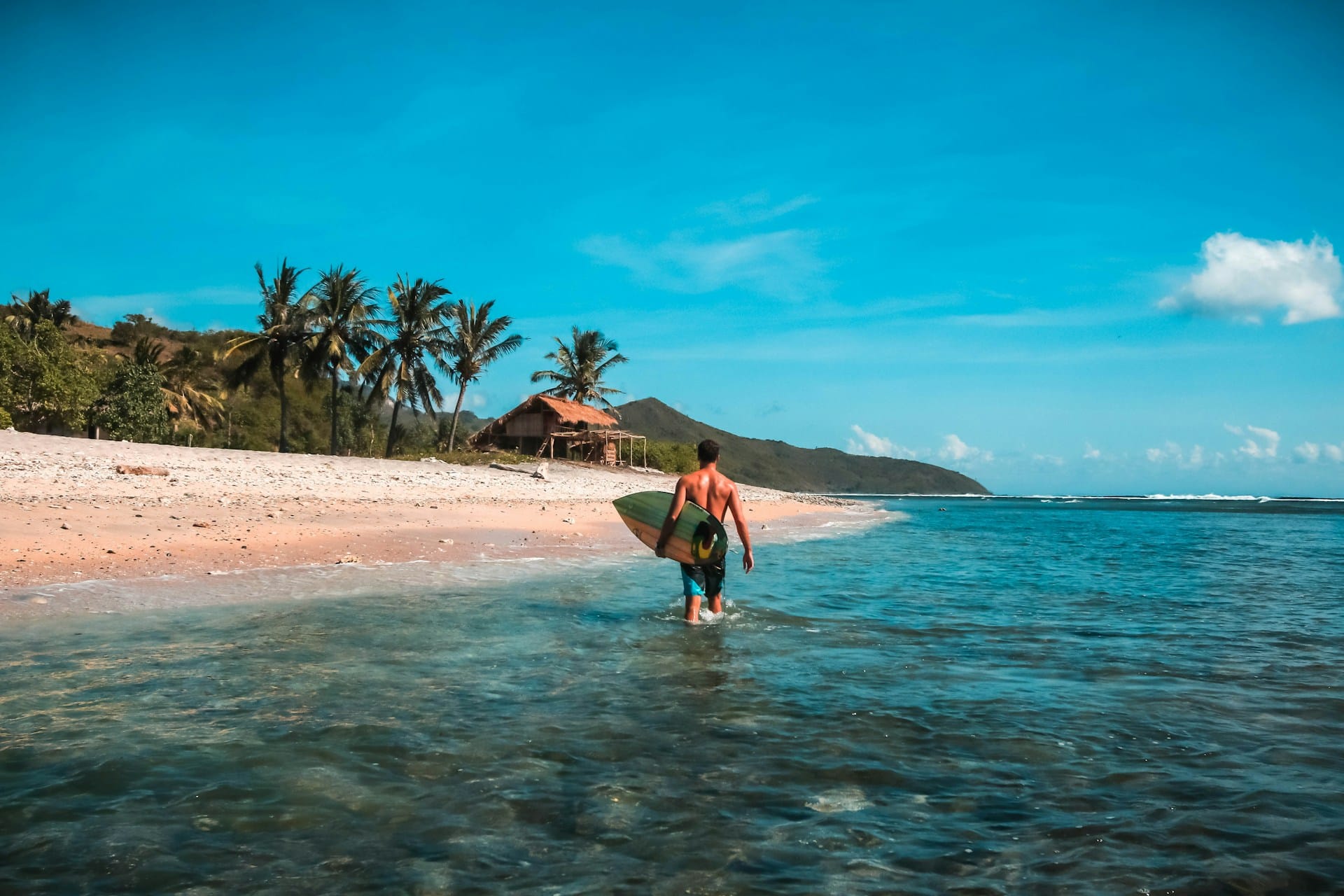 Men with Surfing Board, Lombok Island, Indonesia